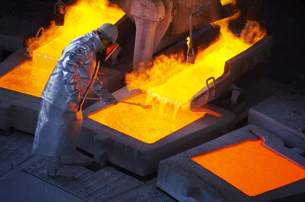 Molten metal being poured in a smelter